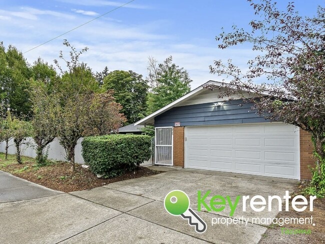 Building Photo - Updated 4-Bedroom, 2-Bath Tacoma Home for Rent Near Tacoma Community College and 6th Ave!
