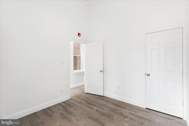 Building Photo - 6940 Woodland Ave