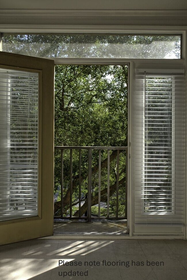 Building Photo - 1x1 New flooring, stove, washer/dryer. Includes Balconette facing a quiet tree lined street.