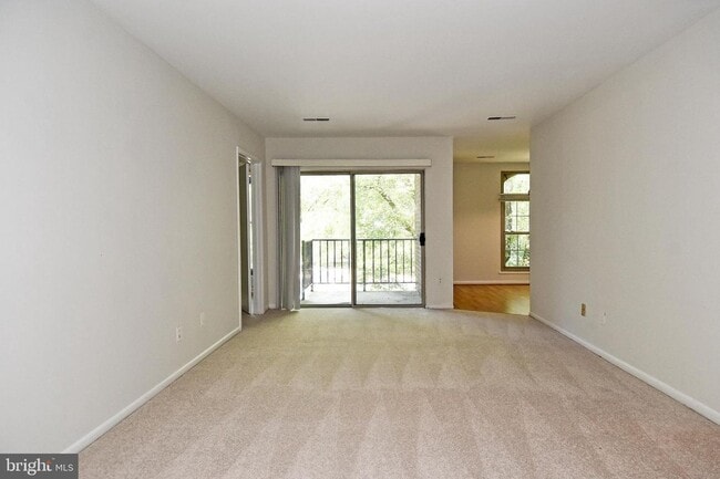 Building Photo - Commuter friendly location has easy access to I495 & Route 50. Metro bus stop in community.
