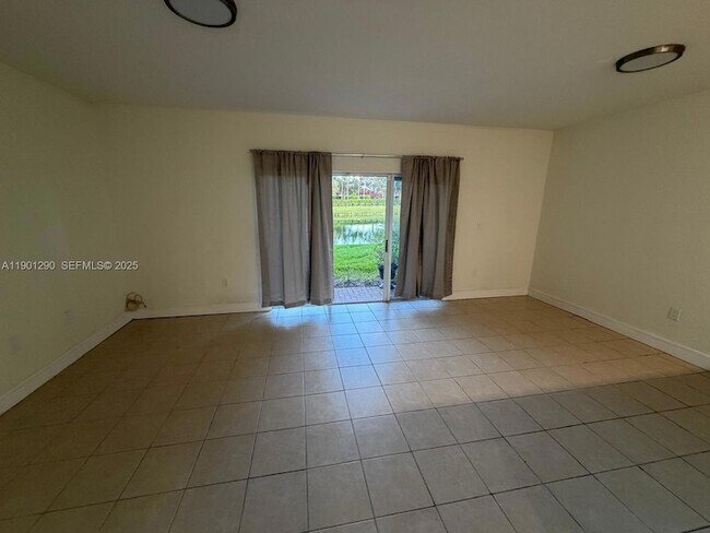 Building Photo - 3390 NE 13th Cir Dr