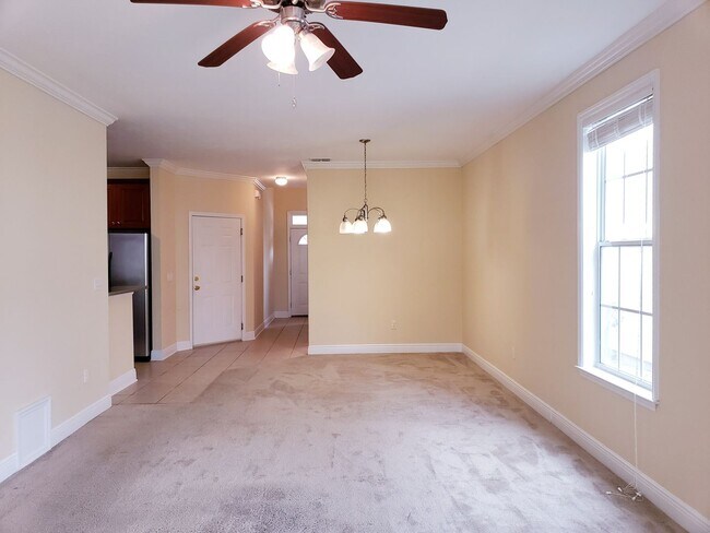 Building Photo - 3 bedroom town home for rent early January 2026, gated community with a garage for $1775 per month