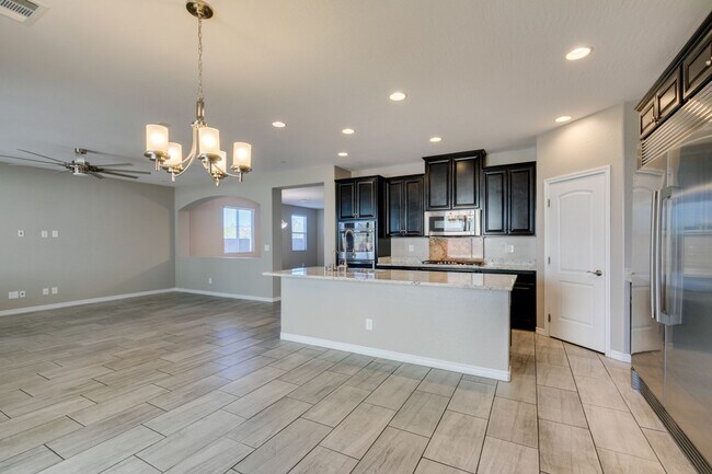 Building Photo - Beautiful Next-Gen Home with Private Entry Suite & Spacious Backyard