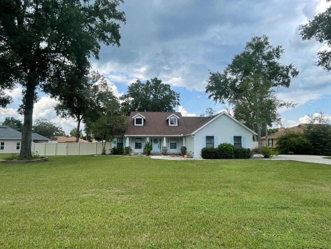 Building Photo - Spacious 4-Bedroom Pool Home – 2 Primary S...
