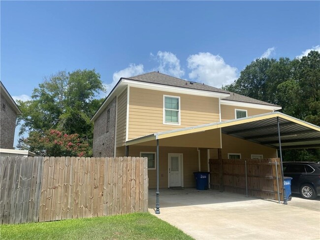 Building Photo - 5017 S Prien Lake Rd