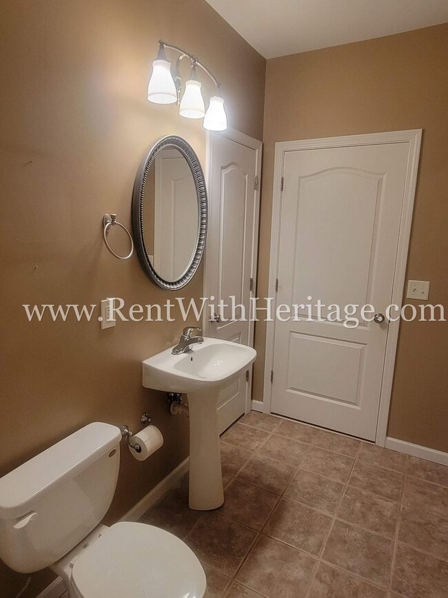 Building Photo - Gorgeous 3-Story Brick Home / 2 Fireplaces / Full Finished Basement / Chapel Hill Schools