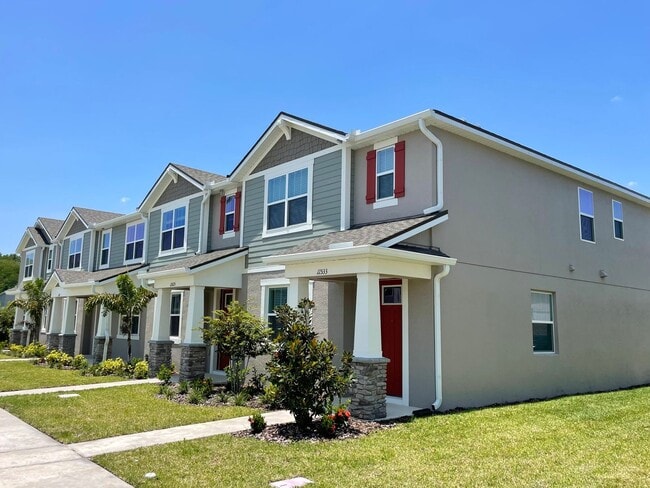 Building Photo - Newer 4 Bedroom, 2.5 Bath Corner Unit Town...