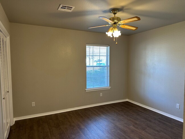 Building Photo - Clean, updated home on a corner lot with privacy fence and storage shed.