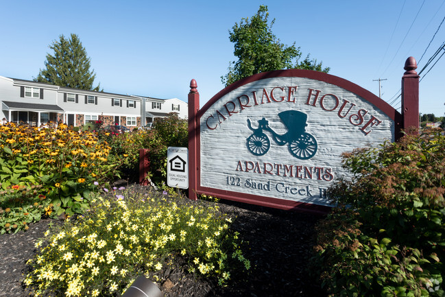 Building Photo - Carriage House Apartments & Townhomes