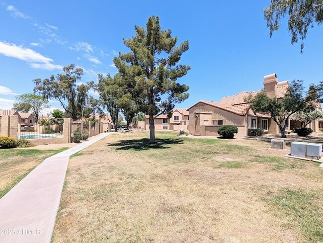 Building Photo - 4601 N 102nd Ave