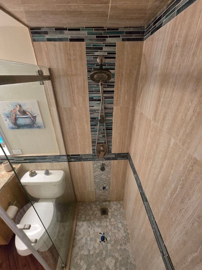 Building Photo - Furnished Beachfront Condo with Stunning Ocean Views