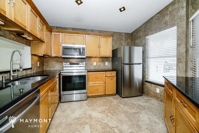 Building Photo - 5874 Woodpoint Terrace