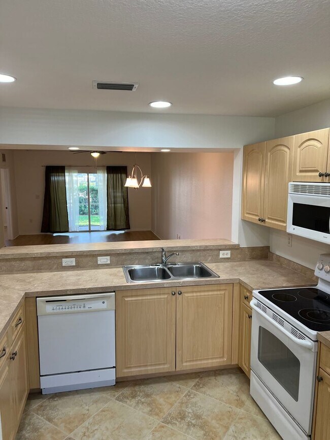 Building Photo - The Porches of Deep Creek Punta Gorda