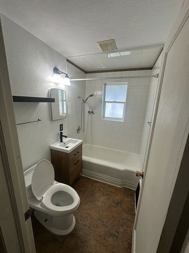 Building Photo - Ideally Located and Updated 4 Bed 2 Bath Fully-Fenced Home w/ Detached Garage/Shop!