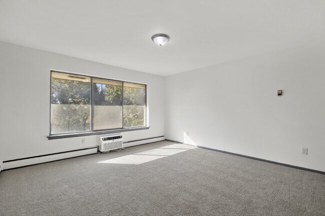 Building Photo - Large, updated, two bedroom available February first