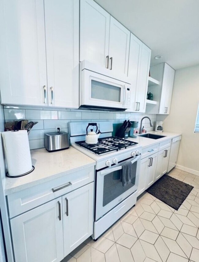 Building Photo - Coastal Luxury Living – Fully Furnished Home with Private Remote Gated Entry!