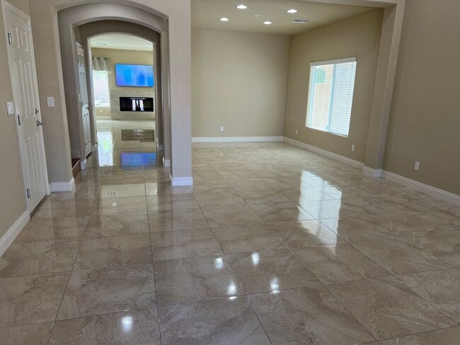 Building Photo - A Fantastic 4 Bedroom Home with the primary Downstairs, in Silverado Ranch