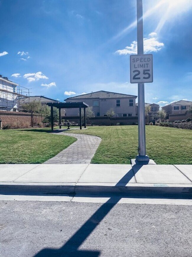 Building Photo - Beautiful Townhome in a Gated Community with 2-Car Garage!!