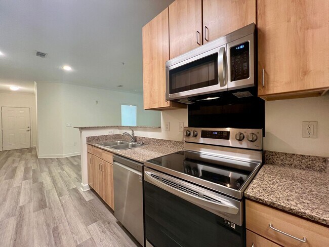 Building Photo - 3-Bed, 2-Bath Condo with Garage! One month...