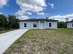 Building Photo - MOVE IN READY 3 BEDROOM 2 BATH LIKE NEW
