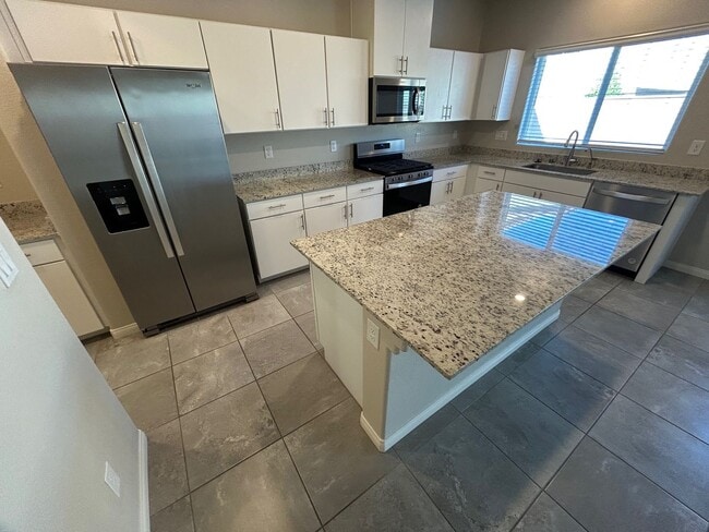 Building Photo - Gorgeous two-story home with 5 bedrooms and 3 bathrooms in a gated community
