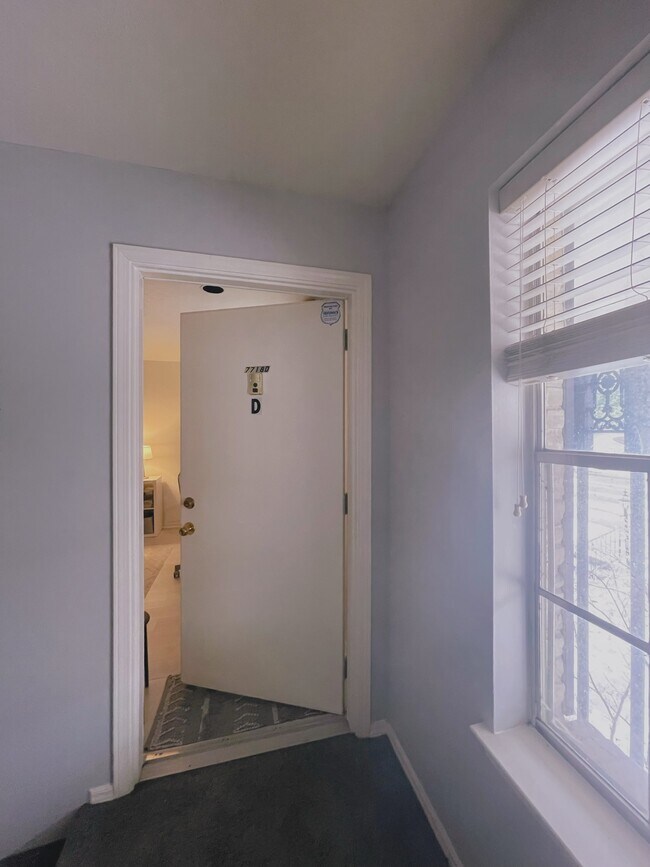 Front door of the unit. - 7718 Royal Ln