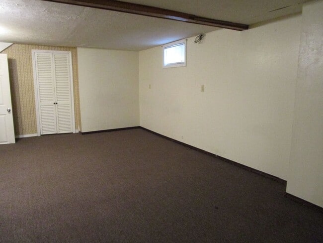 Building Photo - Privacy Fence and a Garage!