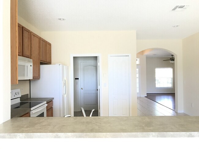 Building Photo - BEAUTIFUL LAKEFRONT SINGLE FAMILY HOME