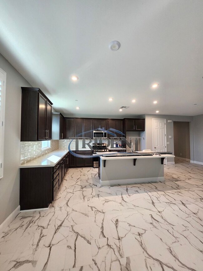 Building Photo - Updated home with a built in BBQ and play area