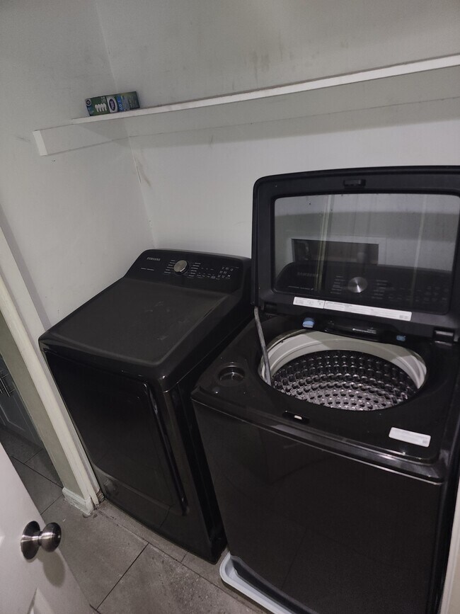 Downstairs laundry - 3218 Dunnbury Ct