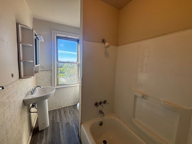 Building Photo - Updated flooring, finished basement, and great outdoor space in a walkable Swissvale location