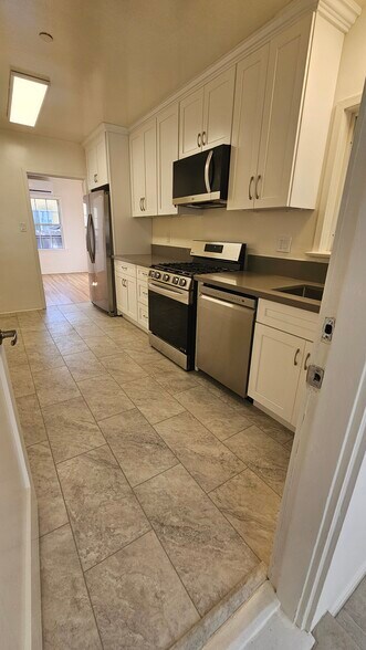 Dishwasher & Vented Overhead Microwave - 4049 Tilden Ave