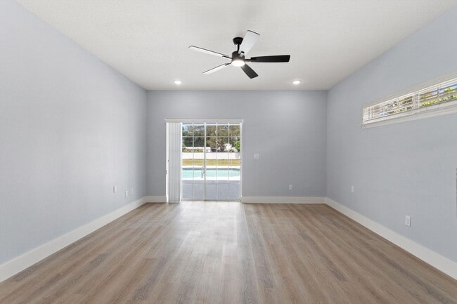 Building Photo - Rare Luxury Lease Opportunity | Spectacular 5-Bedroom Pool Estate on Nearly ¾ Acre Near Gulf Beaches