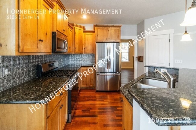 Building Photo - 6106 E 14th Ln