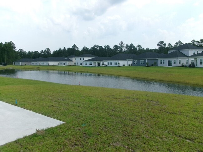 Building Photo - New 5 bedroom, 3 bath home in Clear Pond with pond view