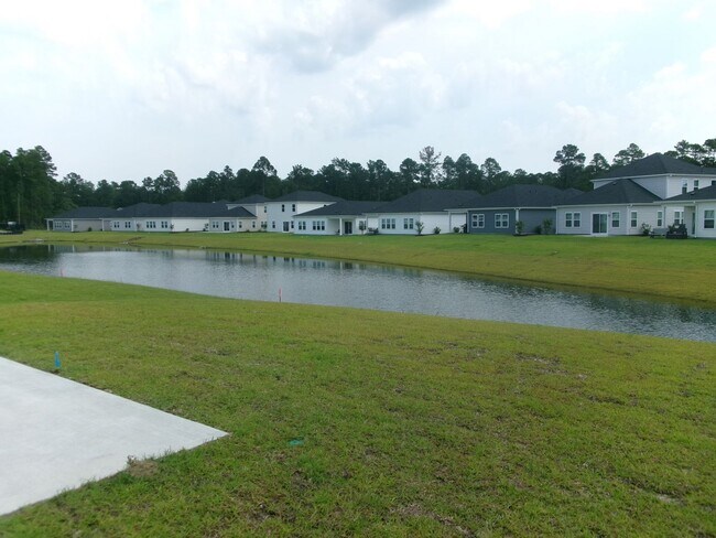 Building Photo - New pond view 5 bedroom, 3 bath home in Cl...