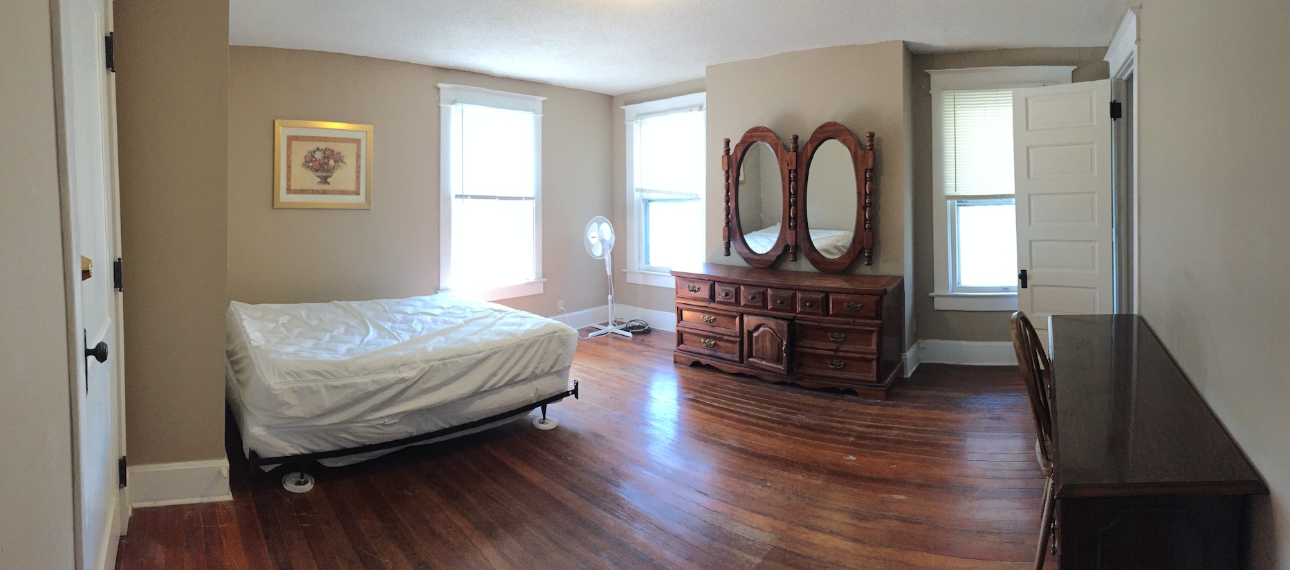 The bedroom as seen from the door. All furniture shown is included. - 1525 South 7th Street