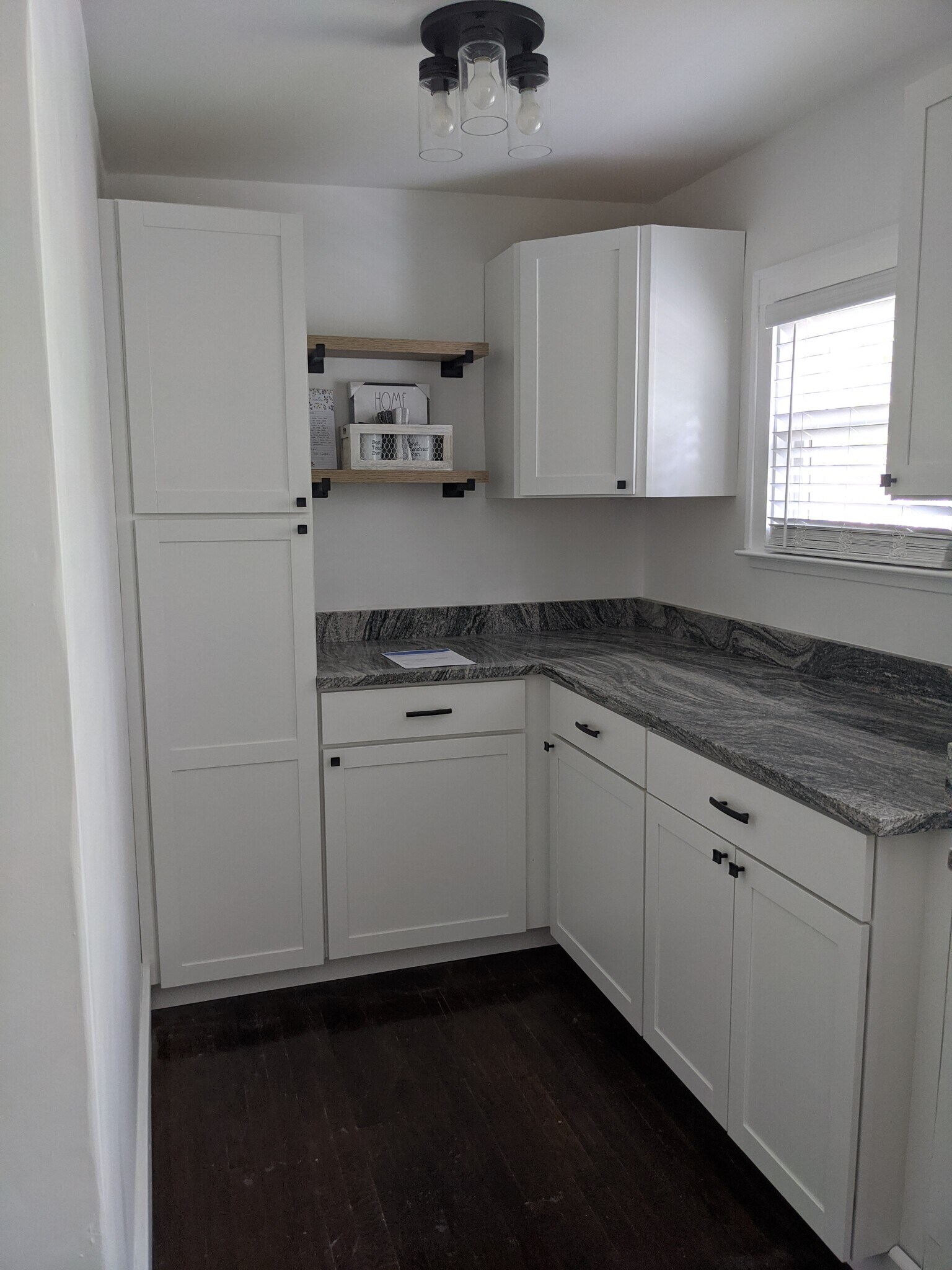 Kitchen and bath are the same layout as the top unit. - 625 Hawthorn Ave
