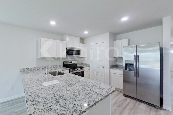 Building Photo - 14255 War Admiral Ave