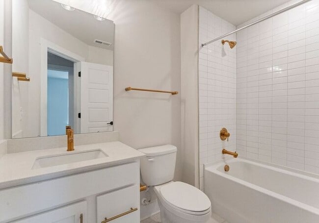 Building Photo - FREE RENT! Stunning 4 Bed | 3.5 Bath Luxury Townhome at The Towns at Rocky River