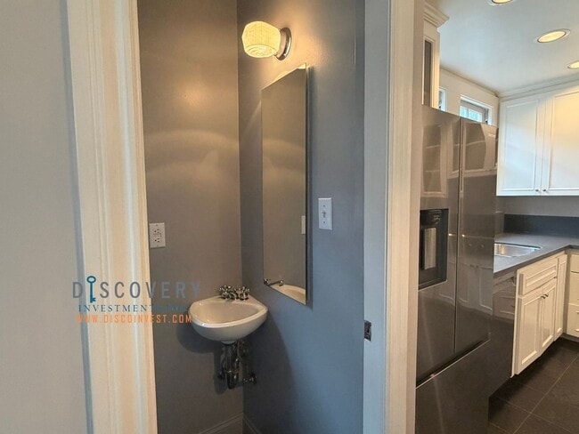 Building Photo - Lakeshore Craftsman with Detached Cottage and Versatile Bonus Rooms