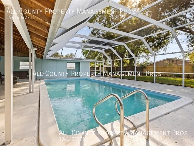 Building Photo - Spacious 3/2/2 Pool Home, Privacy Fenced Y...