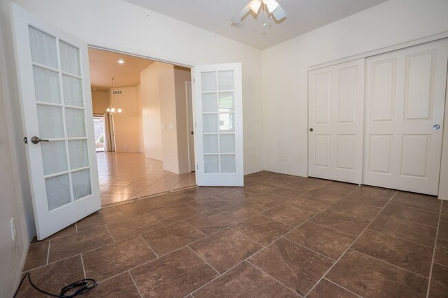 Building Photo - Gorgeous 3 Bedroom 2 Bathroom Home with Tile Throughout! Central A/C, 2 Car Garage!