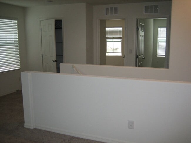 Building Photo - Beautiful 3 Bd, 2.5 bt Two Story home in a gated community with 2 car garage.