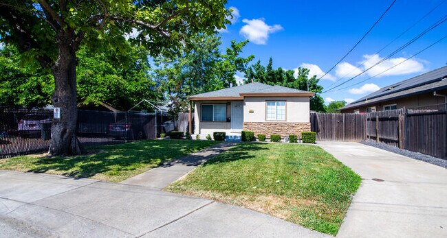 Building Photo - ALF OFF One Month’s Rent! Updated 3BR Home with Garage & Yard – Prime Sacramento Location