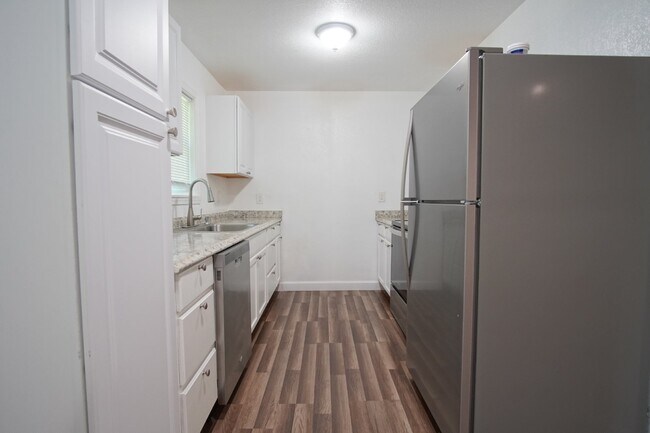 Building Photo - 4BR Home with LVP Flooring, Open Layout & Large Backyard Near Dogwood