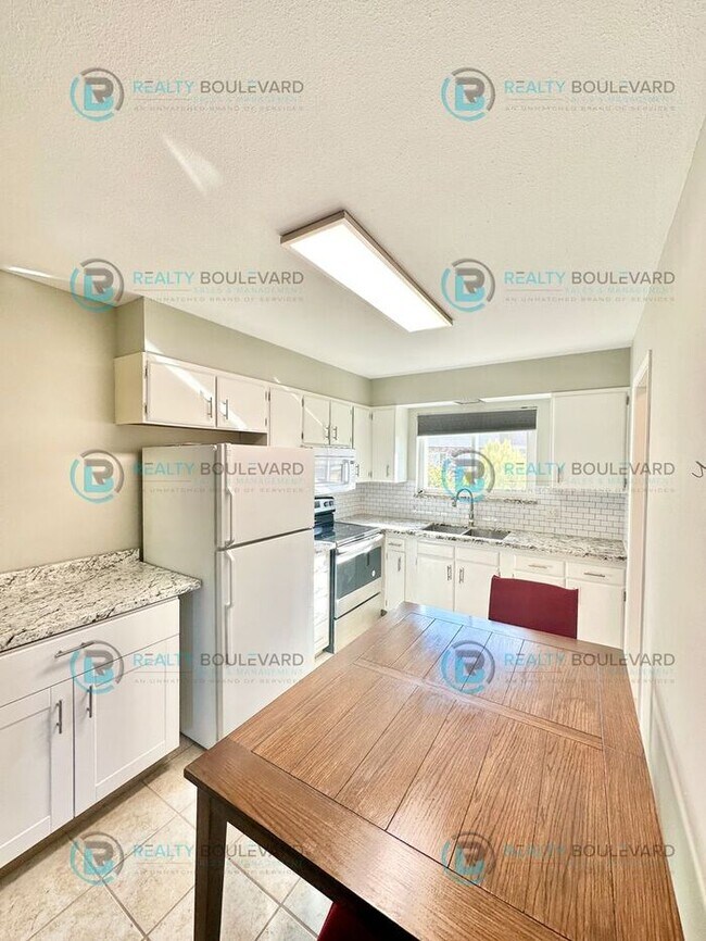 Building Photo - 2-bed, 2-bath, 2-story townhome with pool and park like setting outside the front door.