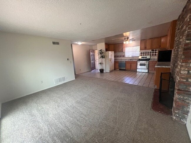 Building Photo - Charming Home with Expansive Yard, Fruit Trees & RV Parking