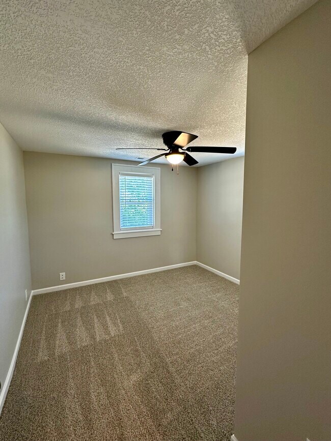 2nd bedroom with double windows, ceiling fan - 2304 Belle Ave NE