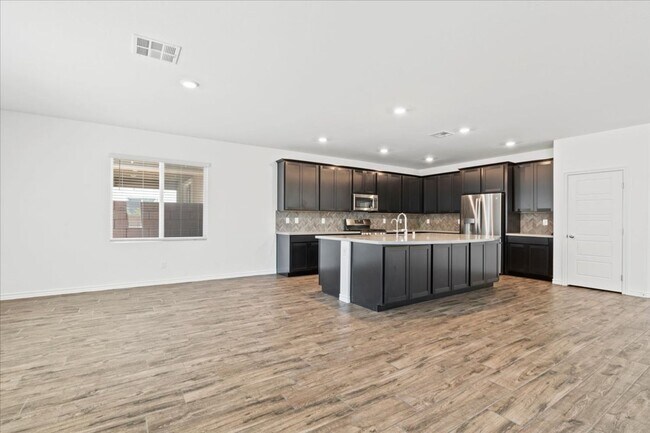 Building Photo - Spacious 5-bedroom home in gated community